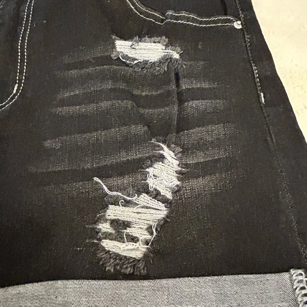 Jeans distressed denim shorts. NWT XL. Folded cuff. Black denim.